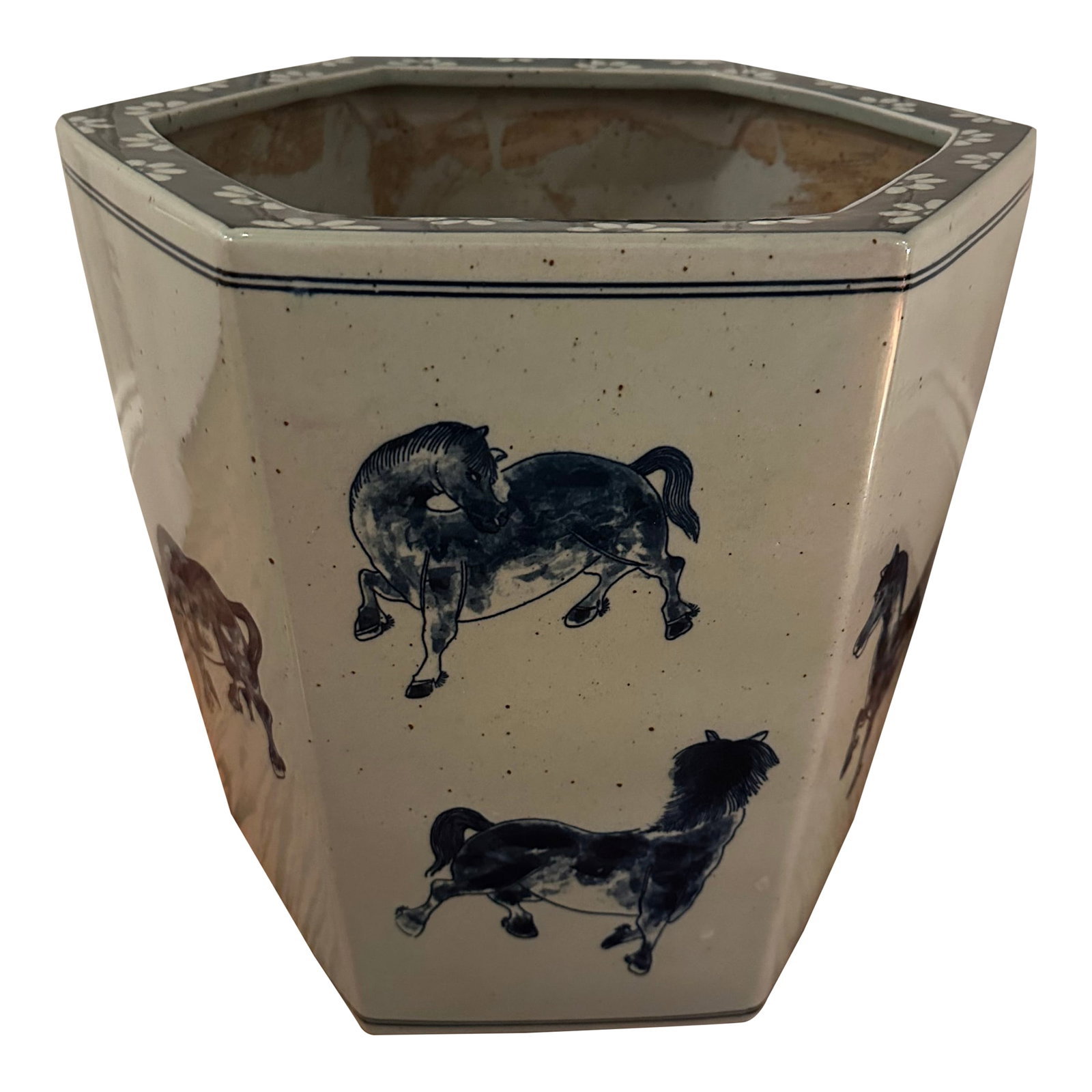 Hexagonal Chinese Porcelain Equestrian Jardenierre: Vintage chinoiserie style planter featuring hand painted blue dancing horses design. Glaze is in great condition with a slight splatter texture, with no chips or crazing. The piece does not have marki