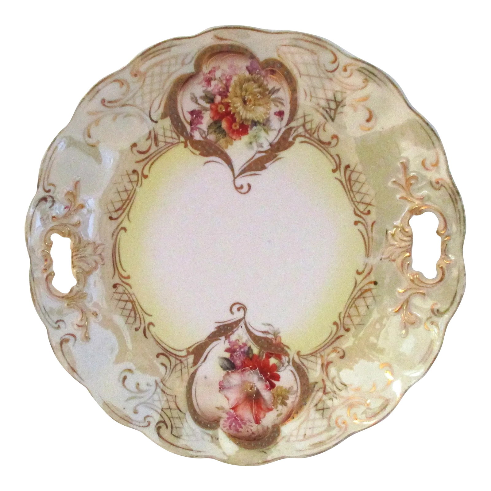 1940s Hand-Painted Lusterware Floral Porcelain Serving Dish: Gorgeous porcelain double-handled lusterware serving dish featuring a hand-painted floral design with generous gold accents on a delicate yellow and white background. No maker's mark. Lovely for use a