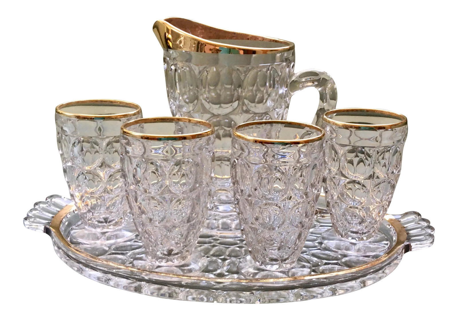 Vintage Jeanette Thumbprint Gold Trimmed Glass Iced Tea Set- 6 Pieces: A beautiful mid century drinks set in very good condition with light wear from use. -Tray measures 13 inches wide at the handles, 8 inches wide at the center and 1 inch tall. -Glasses measure 4
