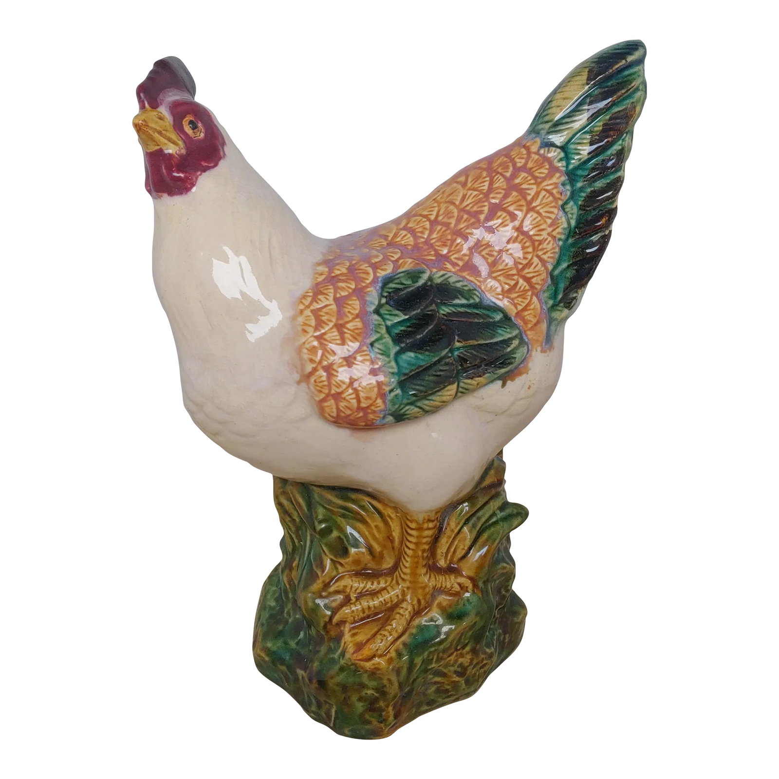 Mid 20th Century French Majolica Hen: A sweet hen turning her head slightly with a quizzical gaze. This piece will make a fine addition to French or rustic country decor. Add it to a growing flock of hens & roosters! Condition: