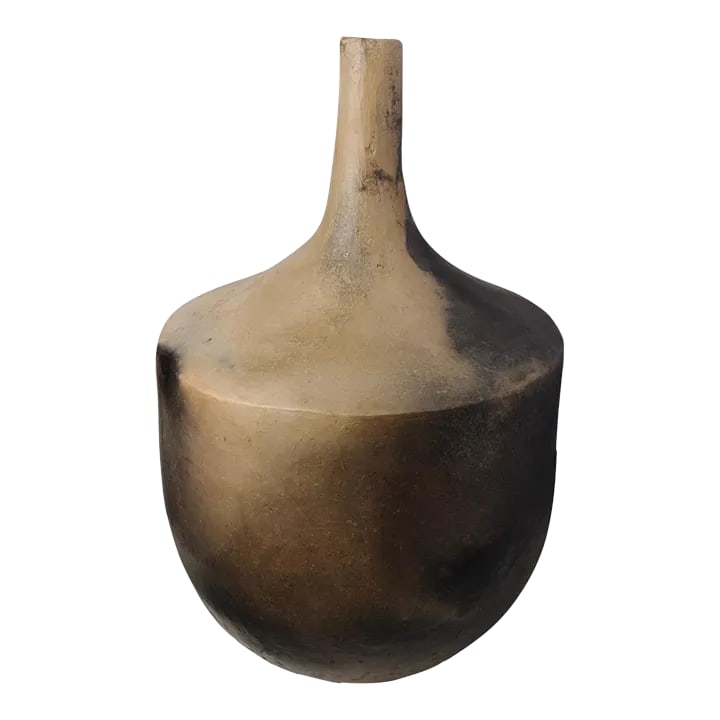 Gafsa Long-Necked Earthenware Vessel: In Northern Tunisia, the women of the Sejnane region have inherited a craft handed down from generation to generation, mother to daughter, passed down for thousands of years. These clay motifs exhibit