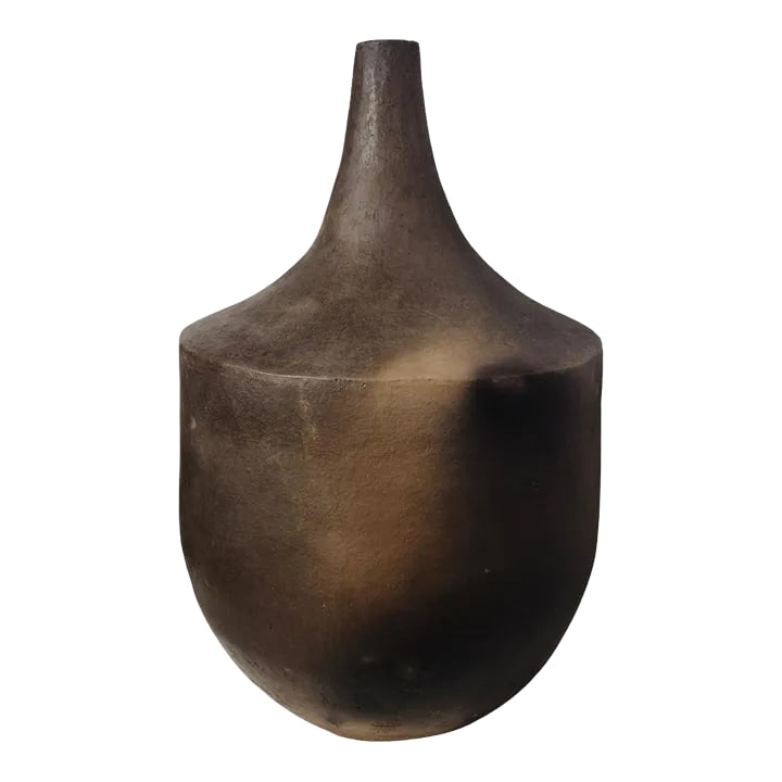 Gafsa Long-Necked Earthenware Vessel: In Northern Tunisia, the women of the Sejnane region have inherited a craft handed down from generation to generation, mother to daughter, passed down for thousands of years. These clay motifs exhibit