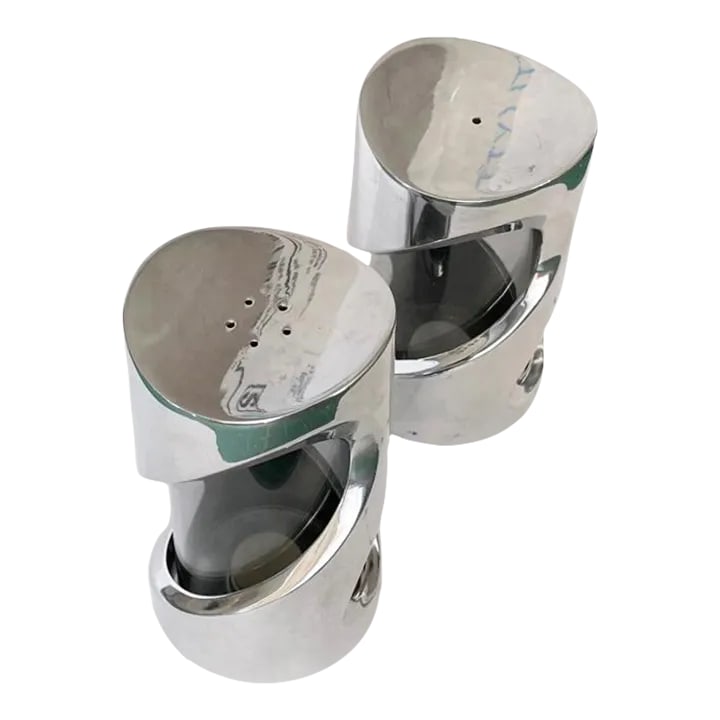 Nambe Salt and Pepper Shakers- a Pair: Beautiful set of chrome and grey glass salt and pepper chakers manufactured by Nambe. this sculptural design is attributed to Karim Rashid. Condition: Alterations: Original Condition Unaltered