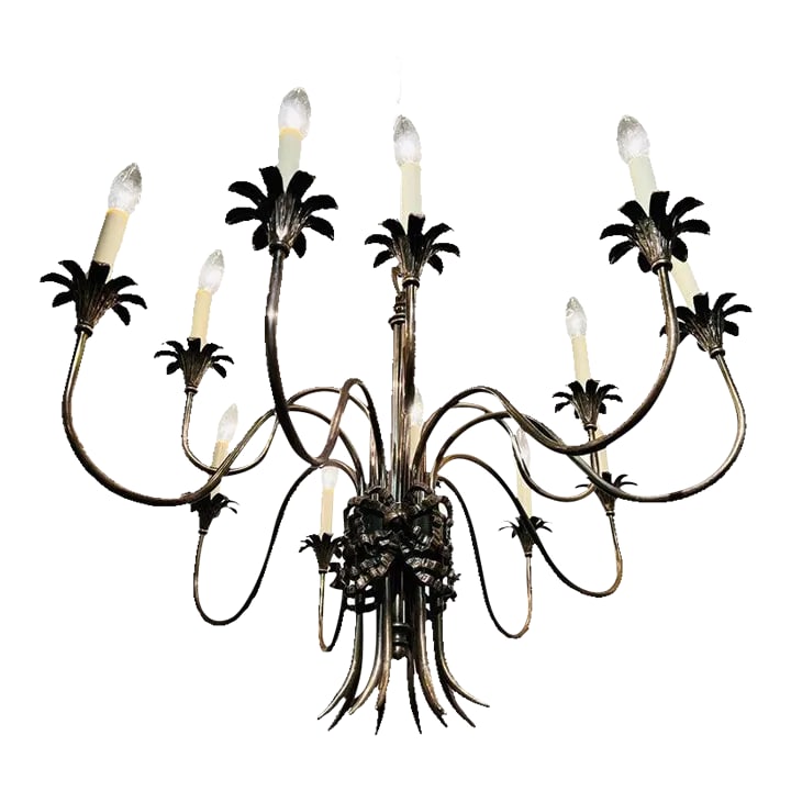 Italian 1950s Empire Silvered Swooping Chandelier: A wonderful Empire style Italian chandelier in the style of Buccellati. Rewired. 12 Light sources. Candelabra sockets. Rewired. 23" is the body. The chain can be adjusted to your needs. Great
