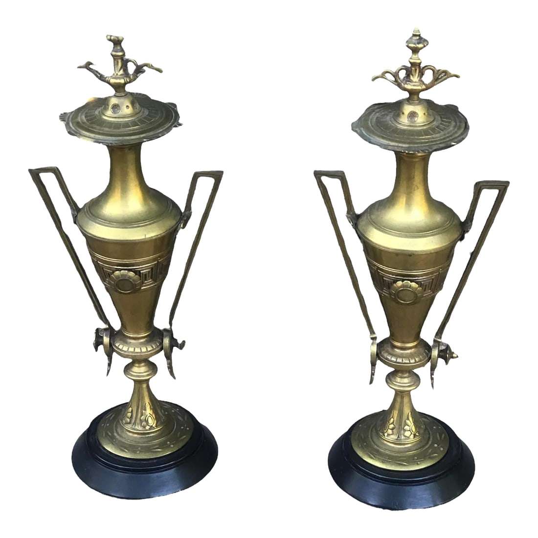 Late 19th Century Etruscan Bronze Dore Antique Urns on Marble Bases - a Pair: Pair of late 19th to early 20th Century Bronze Dore Etruscan Urns on black marble bases. Perfect for your mantle or to add old world elegance in your home. Condition: Alterations: Original Condition U