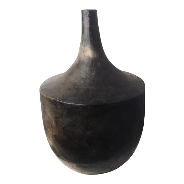 Gafsa Long-Necked Earthenware Vessel: In Northern Tunisia, the women of the Sejnane region have inherited a craft handed down from generation to generation, mother to daughter, passed down for thousands of years. These clay motifs