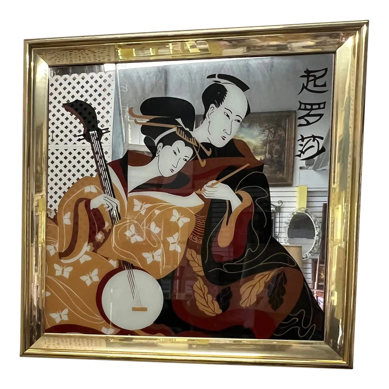 1980's Contemporary Asian Mirror: 1980's Large gold chrome framed mirror with an Asian flair. The picture of a gesha and her man seems to be painted on the glass. This is large mirror measuring 42" x 42" Condition: Alterations: Origin