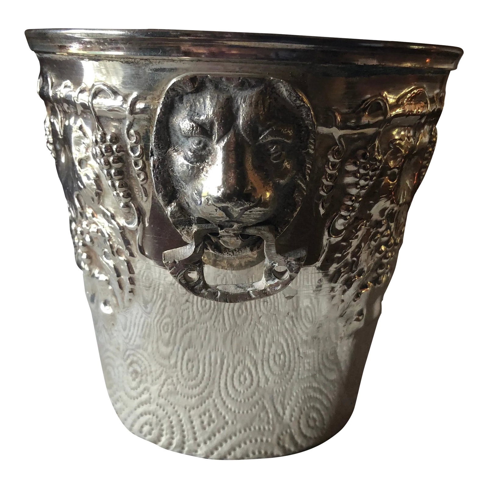 1980s Silverplate Lion-Head Planter Cachepot, Greece: Made in Greece. Silver plate planter with lion heads on sides. Grape leaves on sides. Engraved on bottom made in Greece Condition: Alterations: Original Condition Unaltered Imperfections: Some Imperfe