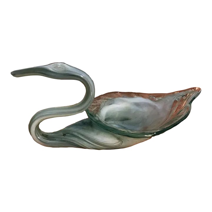 Vintage Murano-Style Swan Bowl: Crafted in the style of Murano glass, this swan-shaped bowl is a stunning piece of art. The light green sage glass used to create the bowl is delicately crafted, with white swirl accents adding a