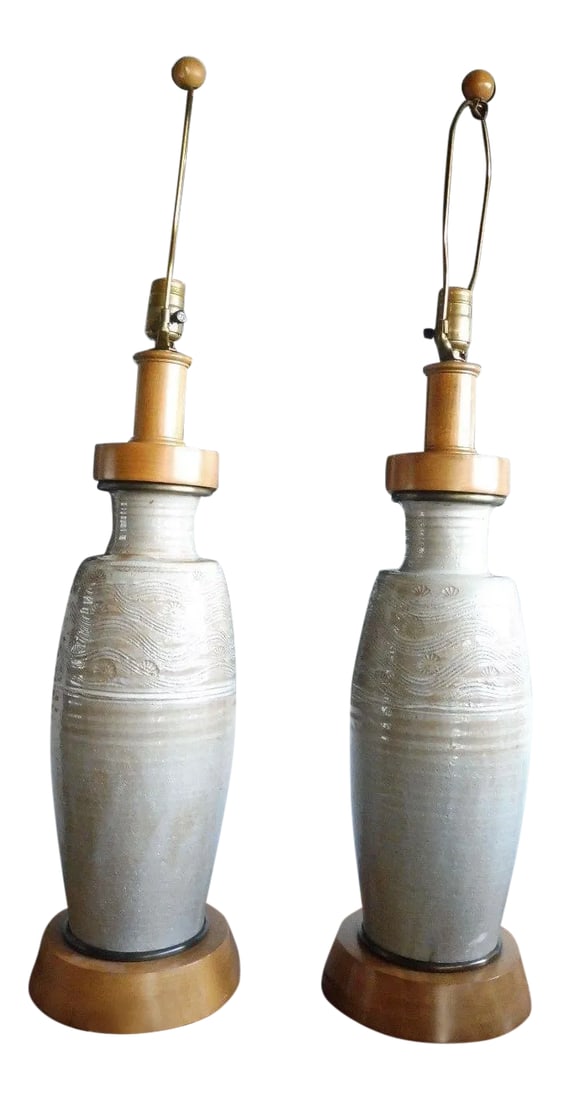 1950s Mid Century Modern Studio Thrown Pottery Lamps - a Pair: Incredible mid century modern studio thrown pottery lamps sold as found showing normal signs of previous use such as minor surface blemishes and crazing to pottery surface but without damage. Lamps ha