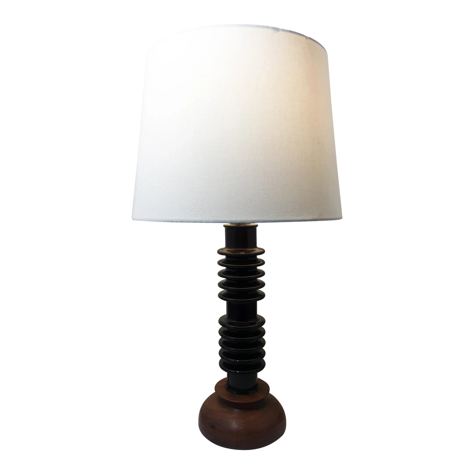 Ceramic Insulator Spool Lamp With Solid Walnut Base: This unique stacked disk lamp features a solid walnut base and spool-like central column in brown ceramic salvaged from most likely a brown ceramic electrical insulator piece. Marked with a gold mark