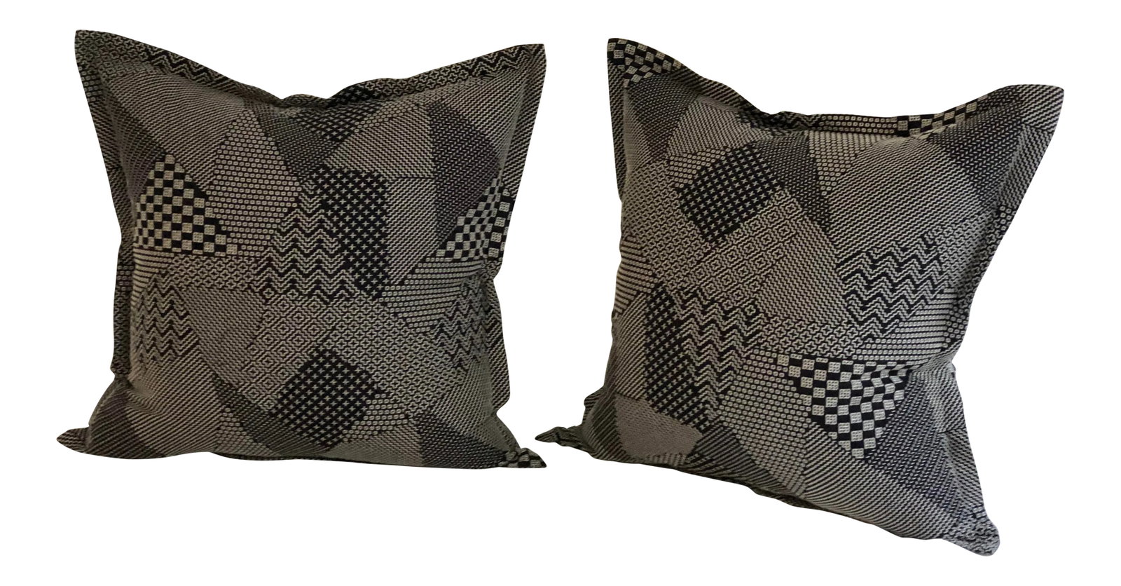 Pair of 20" Square Black and White Stitched Patchwork Pillows by Jim Thompson: Boho Chic pair of 20" square pillows of black fabric with white geometric stitching in patchwork style sections. The pillows are made in Thailand by Jim Thompson and have a flange edge, hidden back