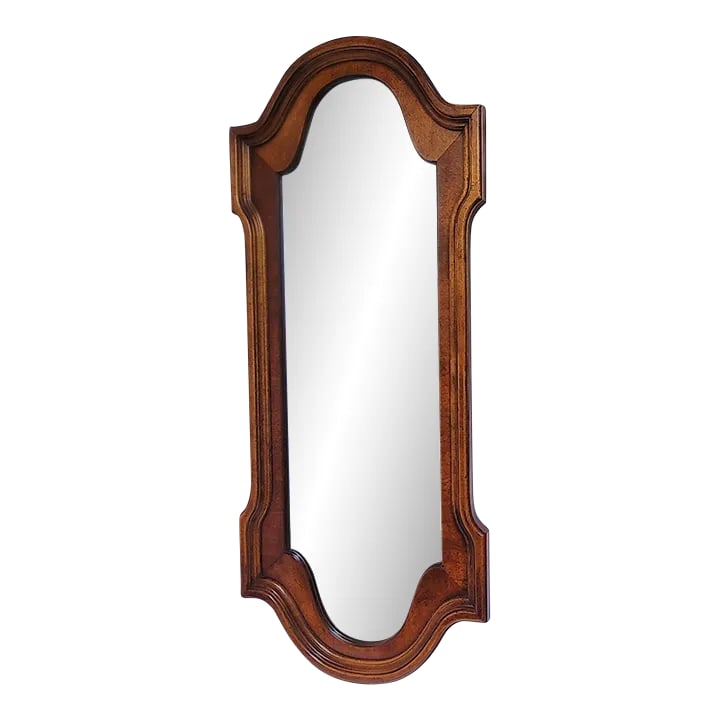 1980s Large Regency Style Bassett Solid Cherry Wall Mirror: A fantastic example of SOLID Wood Construction. This mirror offers traditional shapes with a Hollywood Regency/provincial twist! Transitional and timeless. Condition: Alterations: Original Condition