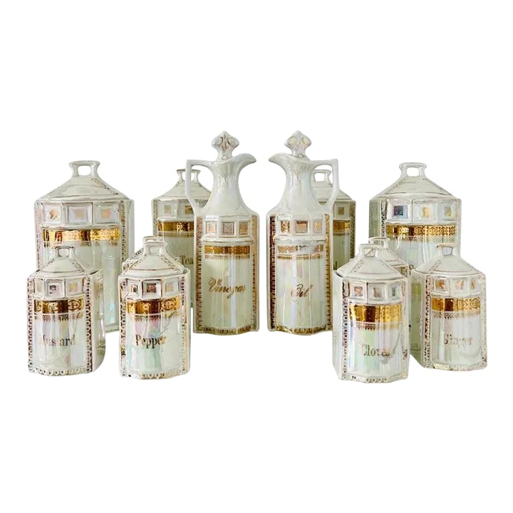 Antique Porcelain Canister Storage Jars and Spice Set / 13, Germany C. 1900: Handmade antique porcelain apothecary and spice canister set with 13 pieces. Hand-painted in 24K gold leaf with iridescent metallic glaze or lusterware. The set includes four large canisters with
