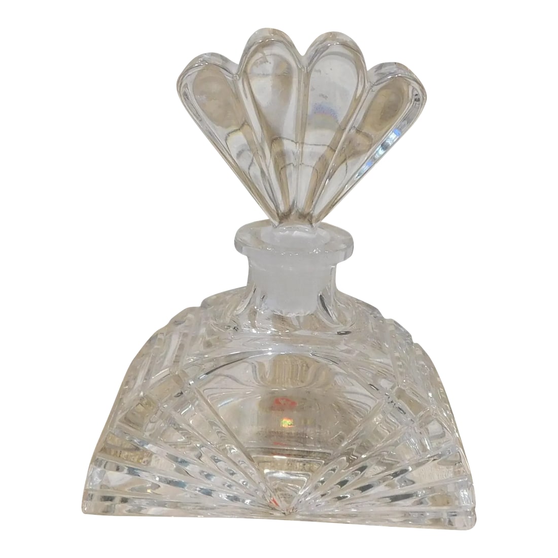 1930s Colle Crystal Perfume Bottle From Italy: This is a cut crystal perfume bottle by Colle Crystal of Italy. It has two stickers on it-one of one side and one on the base. It has a well-fitting and matching stopper. The bottle measures 3.50