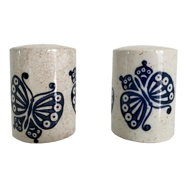 1970s Otagiri Speckle Ceramic Salt and Pepper Shakers With Butterfly Motif, Set of 2: Offered is a lovely set of Japanese stoneware ceramic salt and pepper shakers. The base color is a gray beige speckled tone with rich dark navy butterflies. Perfect in any home that loves blue, mid ce