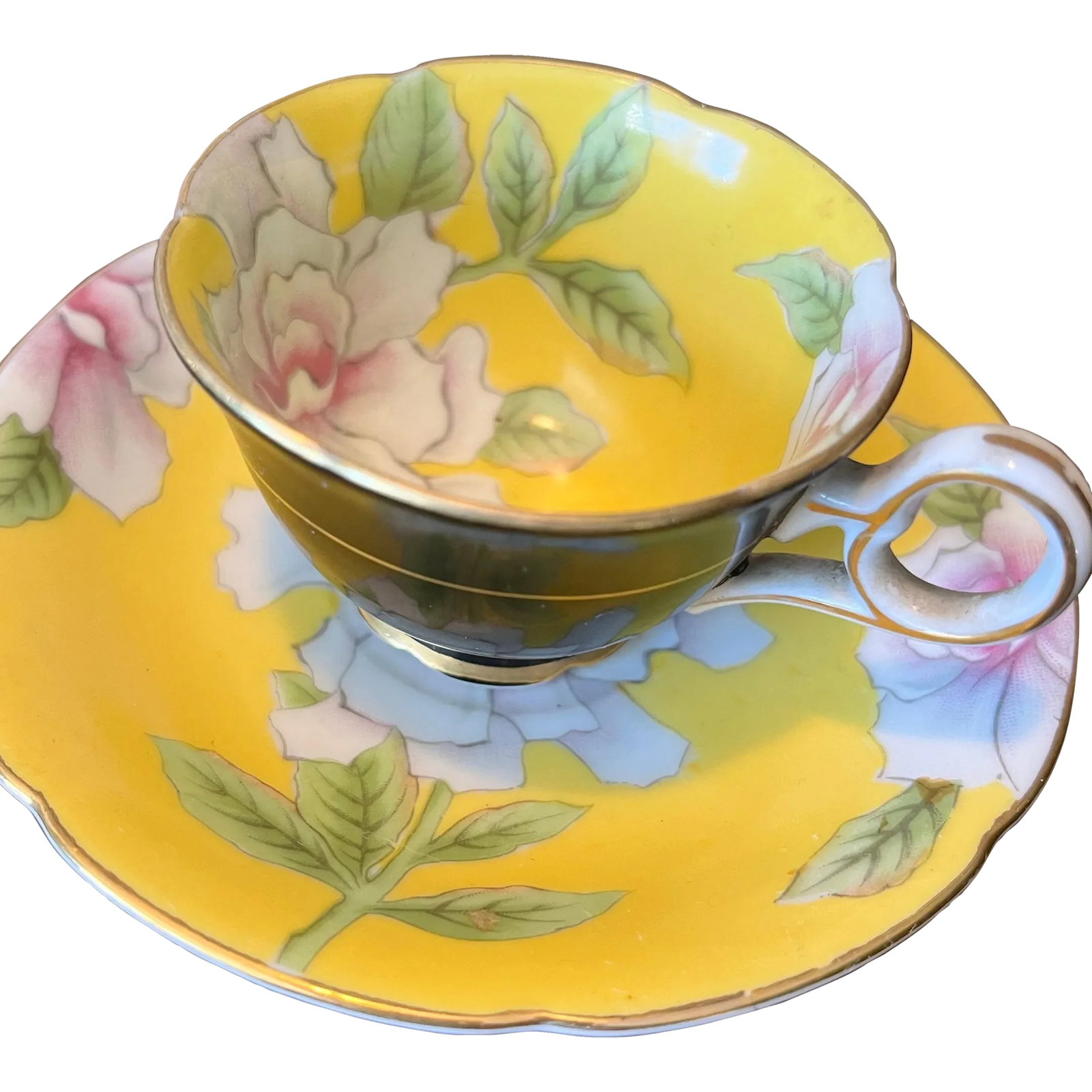 1940s Occupied Japan Yellow Tea Cup & Saucer: Vintage yellow & black occupied Japan small tea cup & saucer. Cup is 1.75 tall & 3.5 wide (tip to tip). Saucer is 4.75 wide & .5 tall. Condition: Alterations: Original Condition Unaltered Imperfection