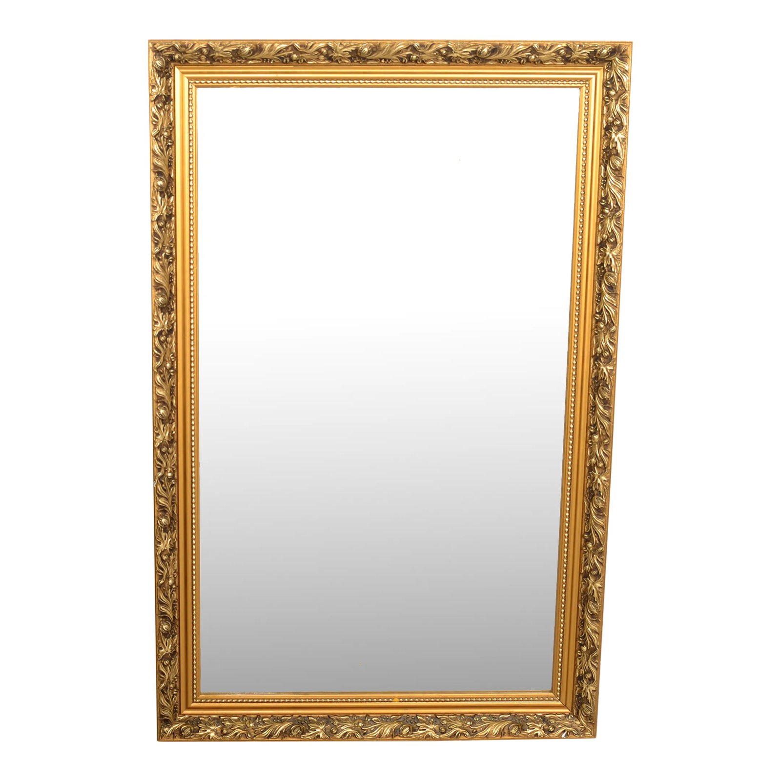 1980s British Neoclassical Giltwood Beveled Wall Mirror Small Dahlia Hand Carved Frame: Exquisite Neoclassical British Beveled Wall Mirror with hand carved wood frame in an antiqued bronze-gilt finish. The frame features hand sculpted small Dahlia designs with floral accents and has midd