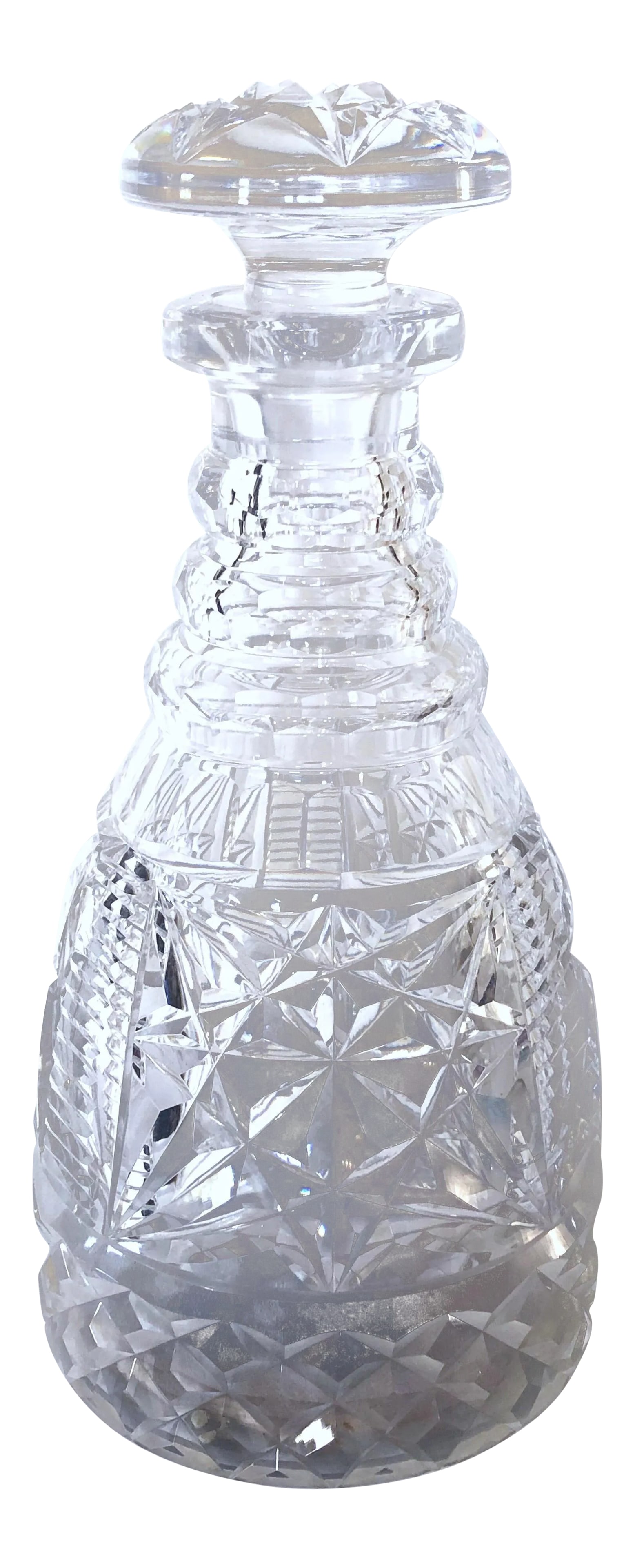 Music Box Decanter: Heavily cut glass decanter with music box on the bottom that plays when you lift the bottle. The tune is a waltz and is operated by a windup key. So when you don't want the music you don't have to hav