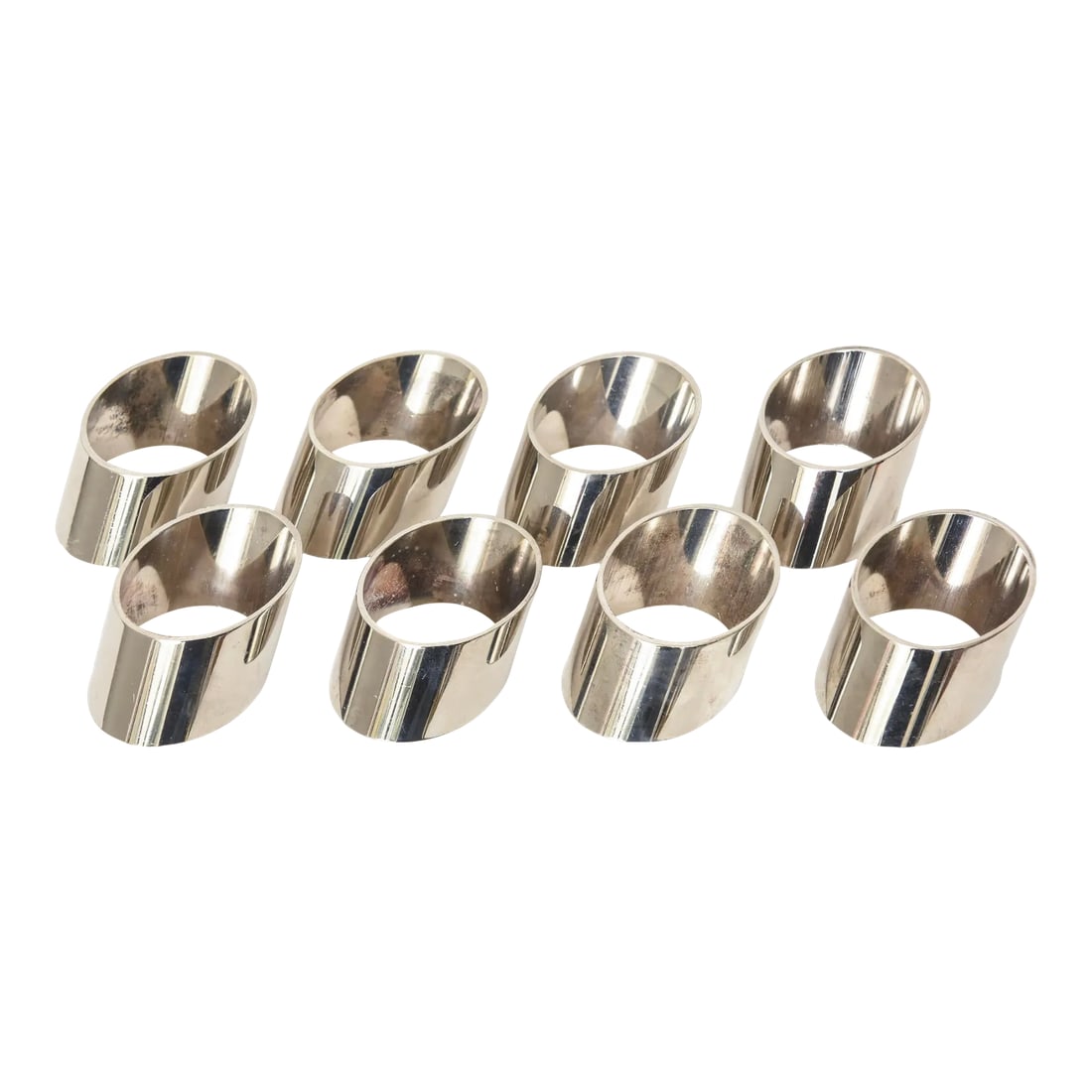 Vintage Sculptural Angled Silver Plate Napkin Rings Set of Eight Italian: This set of 8 vintage sculptural silver plate napkin rings make a great table setting. They are angled. From the 80's. Italian. modern and sleek. PLEASE NOTE: WE ARE NOW AT ROCK BOTTOM PRICE FOR THESE