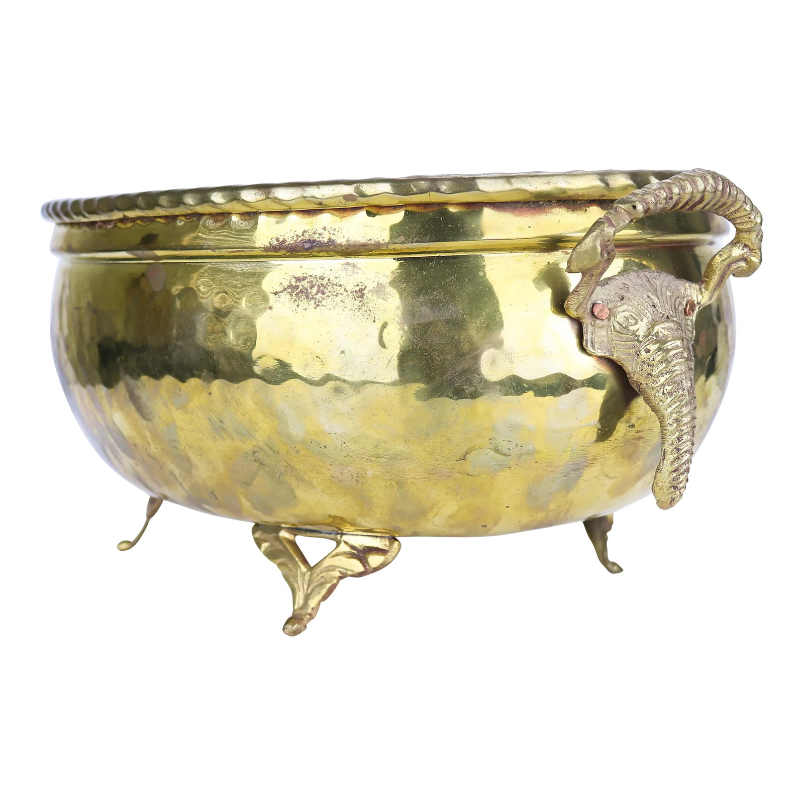 Large Vintage Hammered Brass Planter With Elephant Handles: Large Vintage Hammered Brass Planter with Elephant Handles This stunning planter is made from solid hammered brass and has a shiny gold finish. It features four ornate feet and two elephant handles. N