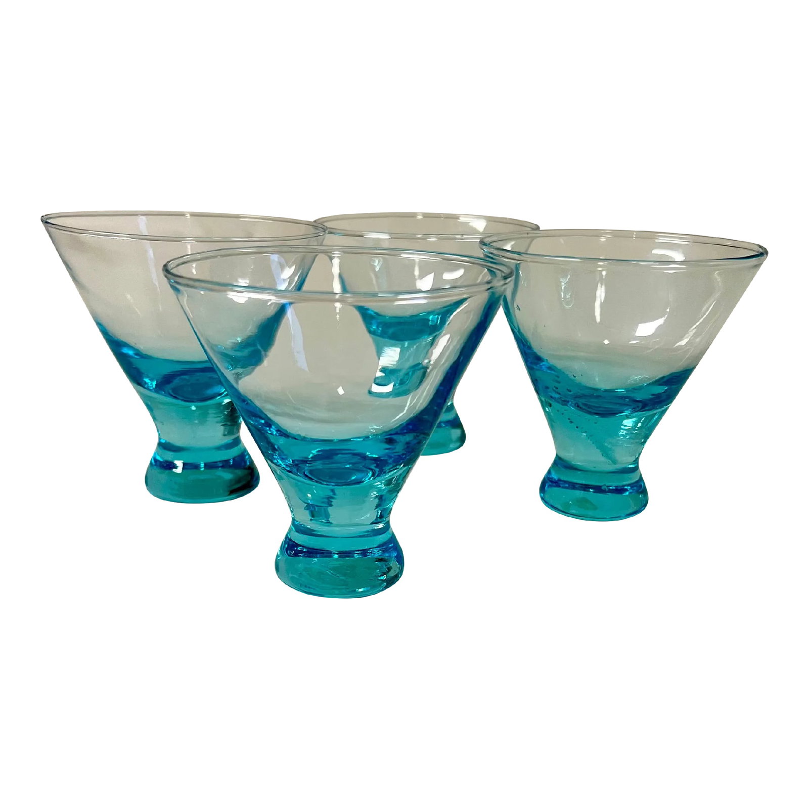 Vintage Handblown Capri Blue Stemless Weighted Cocktail Glasses- Set of 4: Set of four- Vintage, capri blue, stemless, handblown cocktail glasses are 3.75" tall. The rims are 3.5" across, and the bottoms are 1.5" wide. All of the eye catching color is in the weighted base,