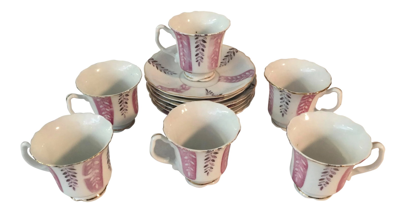 1940s Vintage Espresso - Service for 6: Lovely And delicate set of six espresso cups and saucers made in Japan. 22 karat gold accent with organic vine design in gold on pink and white. Just a lovely little set Condition: Alterations: Origin