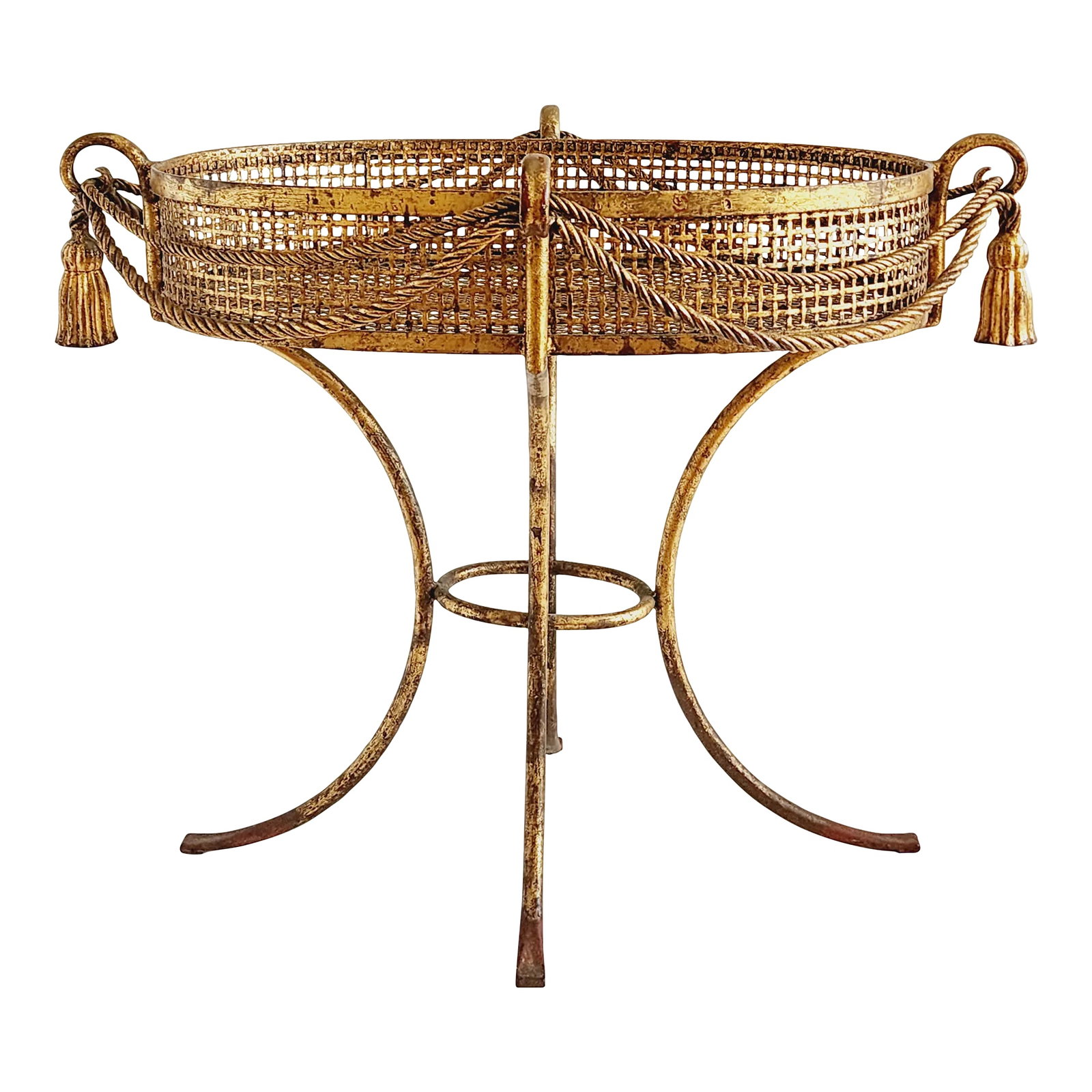 Vintage Hollywood Regency Style Gilt Iron Plant Stand: A very decorative Hollywood Regency style Italian gilt iron plant stand, featuring tassels and rope design. Perfect for fern or large plants, it will add sophistication and glamours to any room.