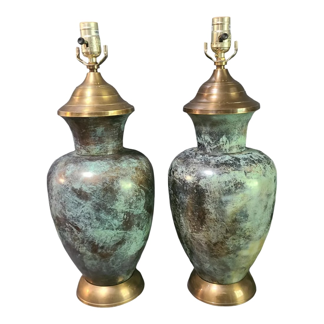 Mid-Century Modern Pair of Metal Patinated Verdigris Brass Table Lamps Original Finial: Add a touch of elegance to your living space with this pair of metal verdigris brass table lamps. The lamps feature an original finial and are corded for electric power source. The blue green color