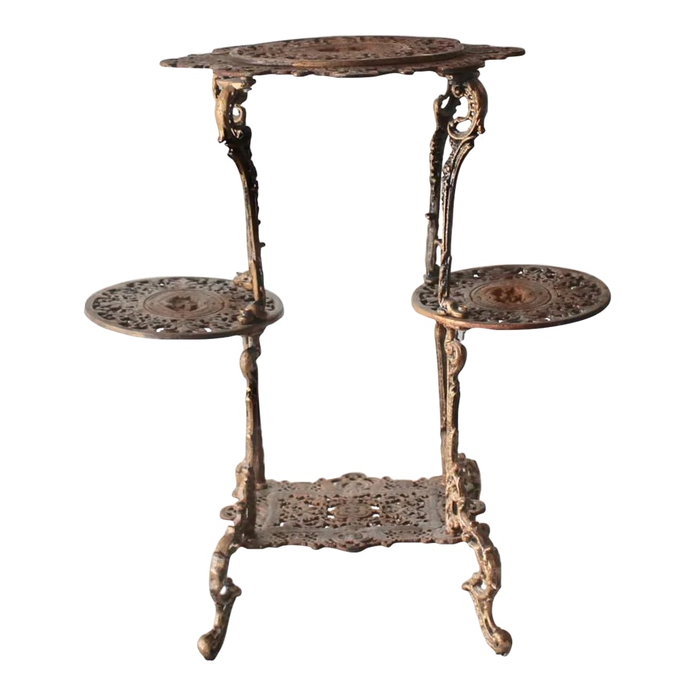 Vintage Victorian Style Ornate Cast Iron Bronze Finish Footed Plant Stand with Patina: This vintage Victorian Style Ornate Cast Iron Bronze Finish Footed Plant Stand with Patina is heavy and sturdy. Wonderfully put together, and easy to assemble when shipped. Good vintage condition