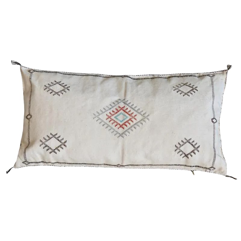 Moroccan Sabra Silk Pillow - White: Our Moroccan Sabra Pillows are perfect for adding a refined boho vibe to any space. Each Pillow is detailed with handwork of Moroccan textiles originally as rugs but turned into pillows. Hand-loomed