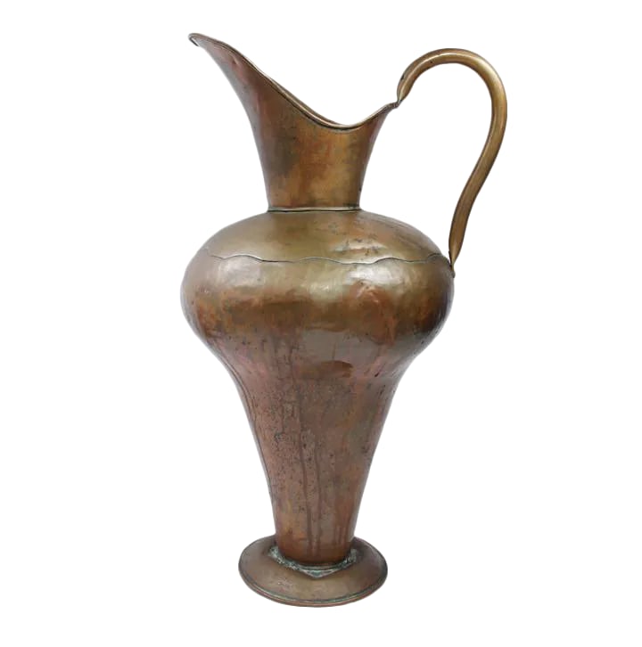 Early 1900s Arts and Crafts Copper Pitcher: This wonderful hand hammered copper pitcher with handle will accentuate any table during the holidays. It's very characteristic of the Arts and Craft movement and is in very good antique condition