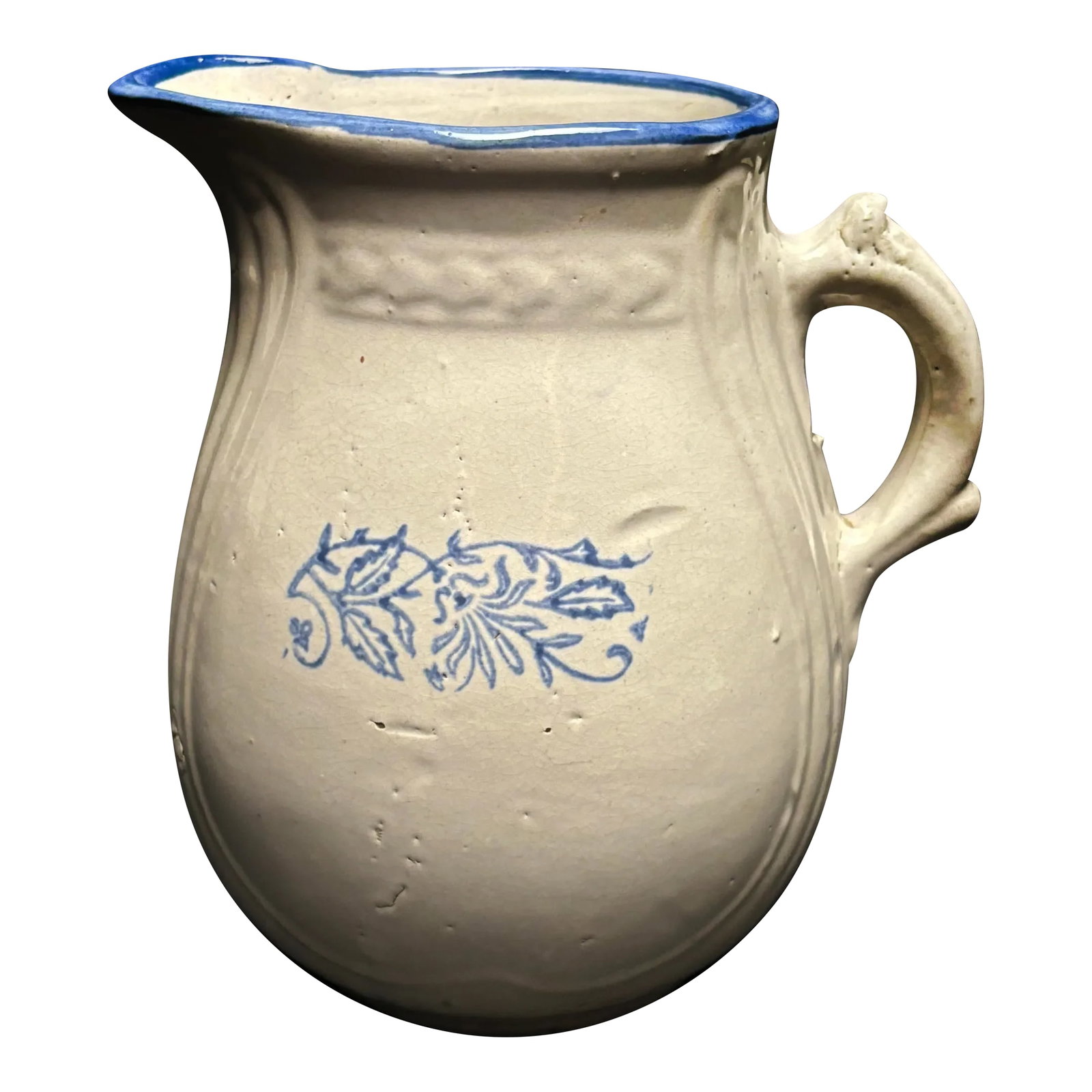 Early 1900s Blue and White Antique Salt Glaze Stoneware Milk Pitcher: This very early blue and white salt glazed, stoneware milk pitcher reflects the early years of the pottery making industry in the United States. By way of the primitive creation of this piece, it