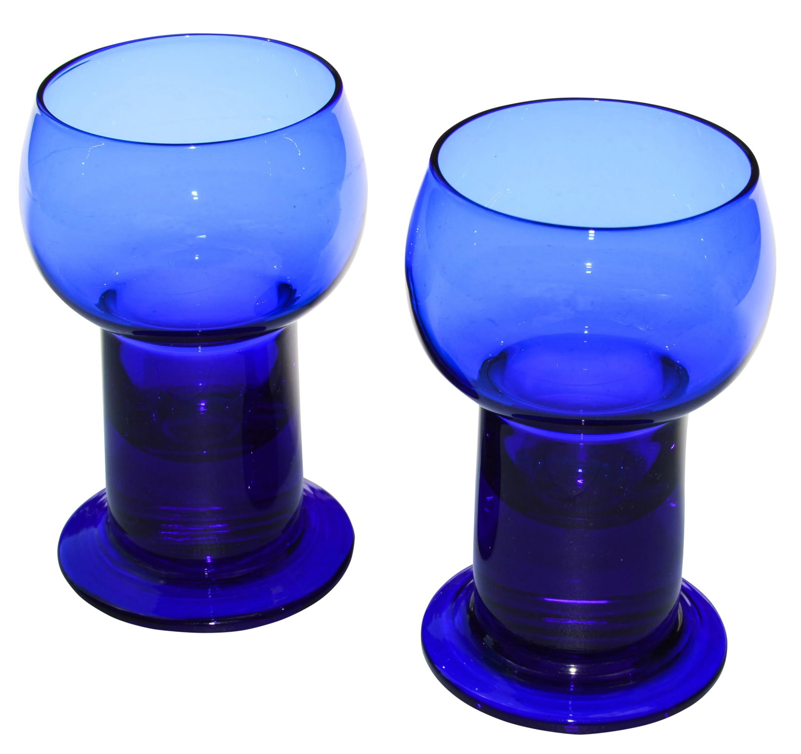 Midcentury Cobalt Blue Glasses- S/2: Set of two midcentury handblown cobalt blue glasses with ornate details. No maker's mark. This beautiful accent ships within 1-2 business days from purchase, and to be received within 2-4 business