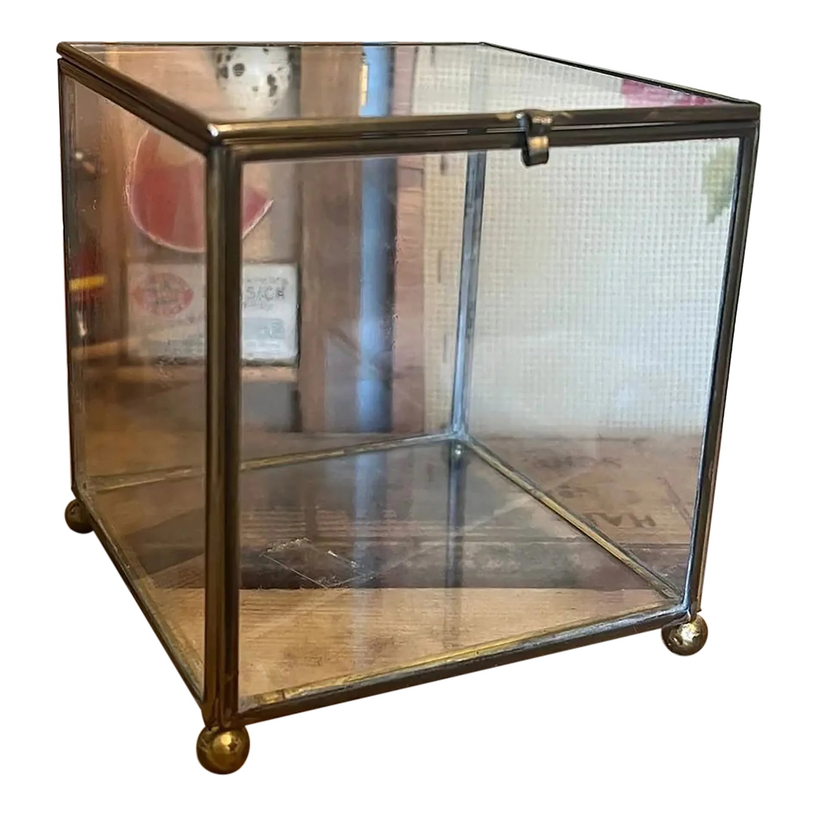 1970s Vintage Footed Brass Metal Glass Trinket Jewelry Box: Brass metal and glass materials. Beautiful patina and character. Can be used for trinkets or jewelry.Vintage condition as pictured.Listing is for described item only. Dimensions: 4.5"x4.5"x4.5"