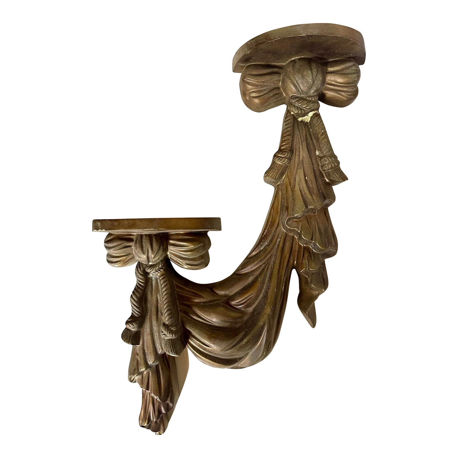 Vintage Dorothy Draper Style Tassel Ribbon Wall Sconce Shelf: This elegant wall-mounted shelf features a classic design with a rich bronze-tone finish. The shelf showcases intricate detailing, including draped fabric and tied bows, creating an antique-inspired l