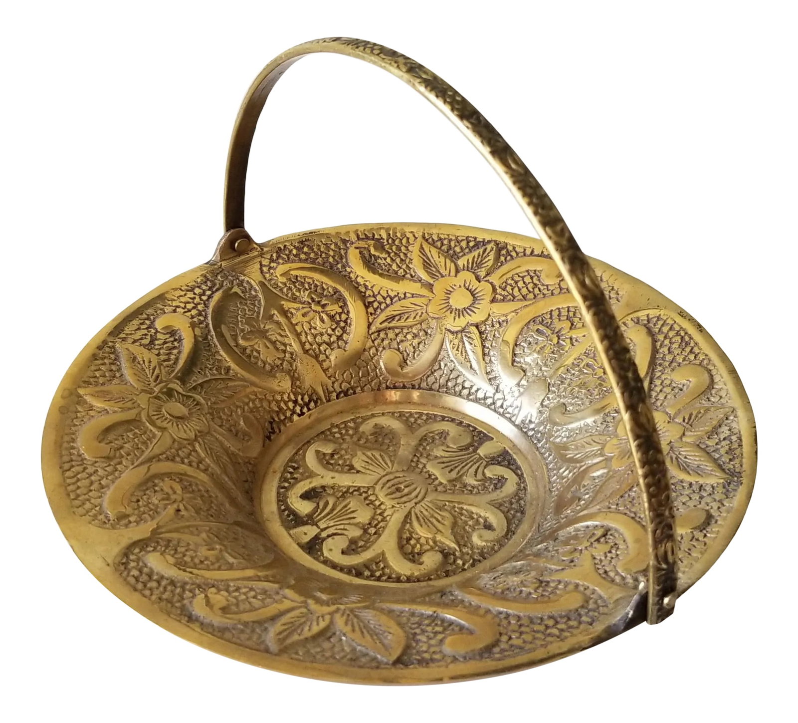 Vintage Brass Basket Candy Dish Articulated Handle Flower Design: We love this extraordinary brass basket for the unique design on the top with smooth brass bottom and articulated handle. The construction screams mid-century quality. Whether it is used for serving