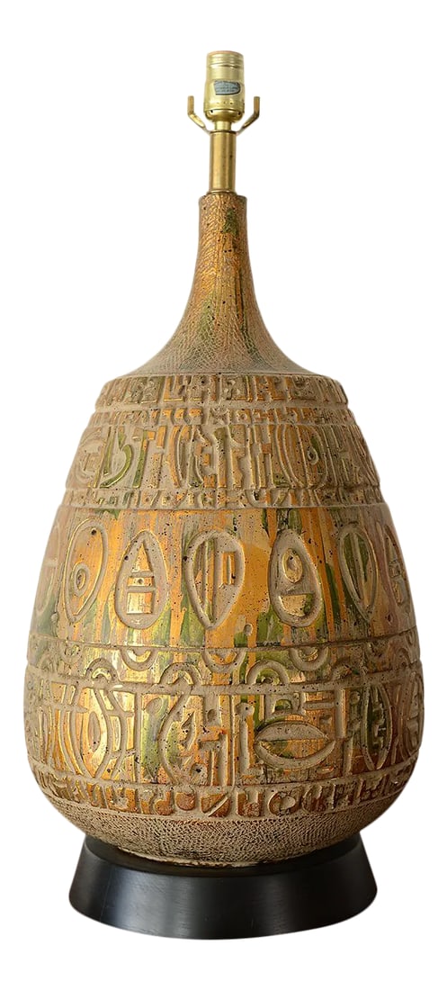 Mid-Century Brutalist Abstract Carved Pattern Table Lamp: Stunning vintage Mid-century modern brutalist table lamp accented with dripping gold and green paint. Surface displays a faux carved wood appearance showing an abstract pattern. It is difficult to det