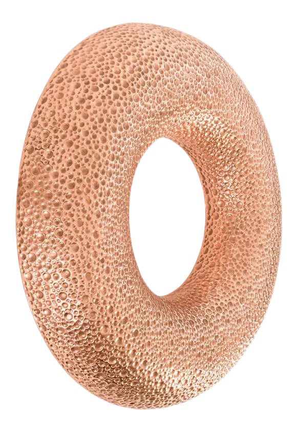 Phillips Collection Donut Wall Art, Copper: This sculptural wall art is made with real copper. It has a textured finish to add interest and character. This piece was created as a sample and never put into production. Condition: Imperfections: