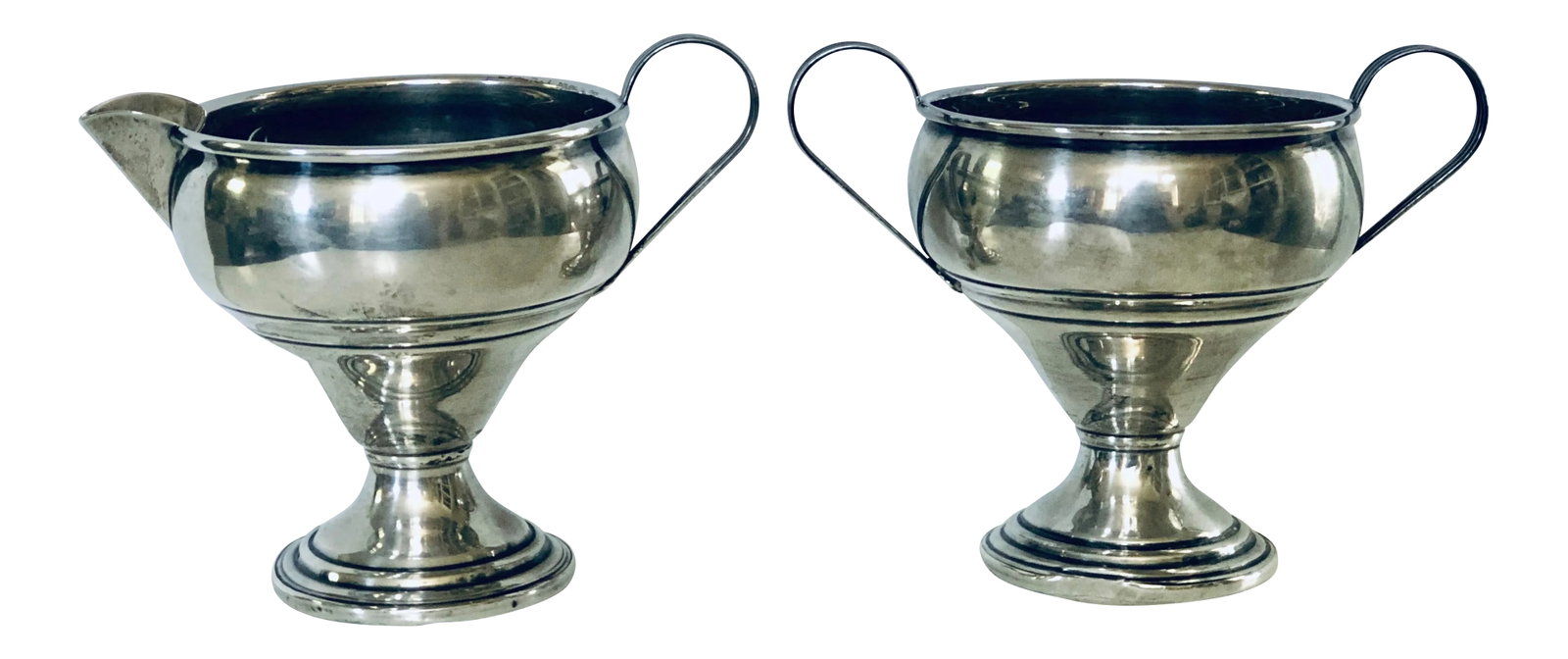 1960s Sterling Cream & Sugar Set - a Pair: Tea time just got an upgrade with this lovely sterling creamer and sugar set made by the New York firm Arrowsmith, makers mark on the bottom of each piece. Fashioned in an elegant trophy style. The pi