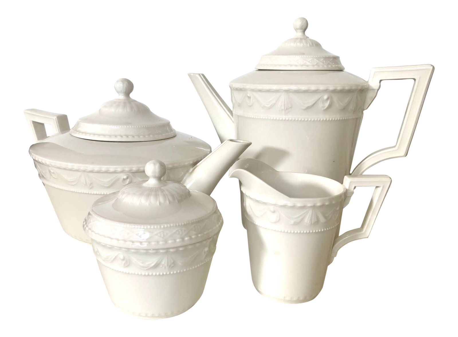 German KPM Berlin Kurland Coffee/Tea Set: This German KPM Berlin Kurland "Blanc Nouveau" white porcelain coffee/tea set features a classicist relief design in a lovely creamy white. The contrast of the banded garland, edged beading and angula