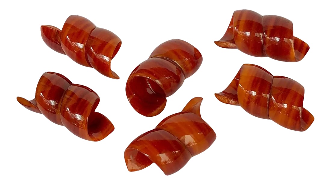 6 Midcentury Napkin Rings Butterscotch Twists: Delightful set of six retro chic twisted curl napkin rings in a deep and glossy amber butterscotch hue with tiger eye striping throughout. The high quality hard plastic or acrylic material resembles B