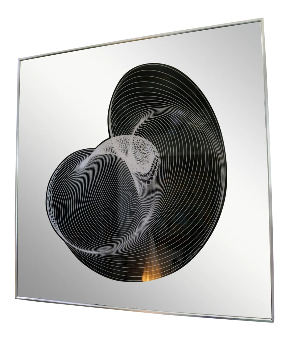 Decorative Mirror Turner Mfg: This stylish, chic and mod 1976 mirror by the Turner Co, with its graphic black and silver swirl form on a mirror field will make a definite statement with its form and use of materials. Note: There
