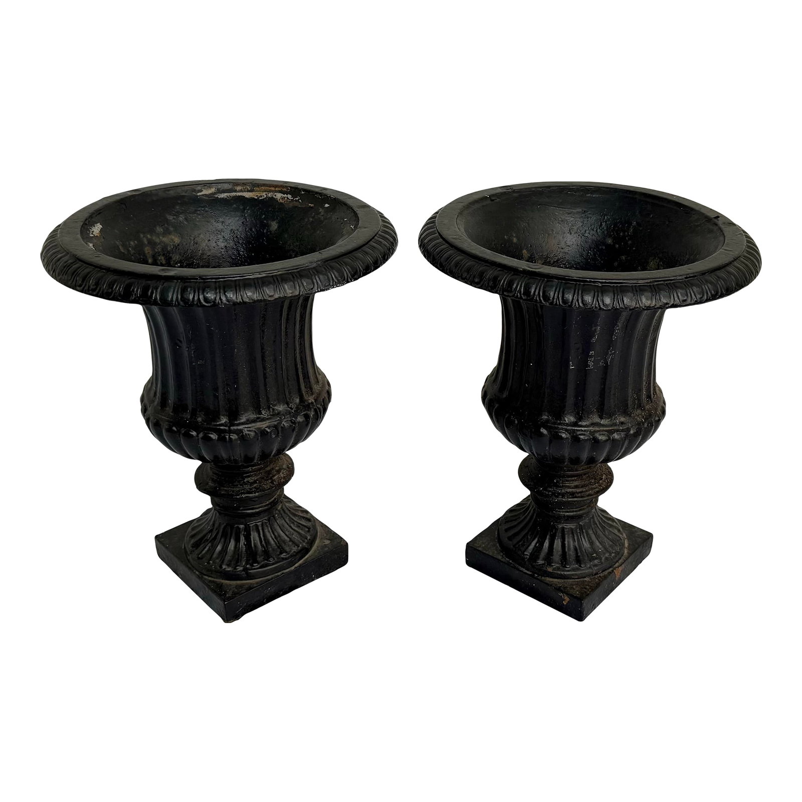 Vintage Cast Iron Planters- A Pair: A vintage traditional pair of cast iron planters, each standing 14" tall, 11.5 round and weighing right around 17 pounds. Condition: Alterations: Original Design Modified Imperfections: Some
