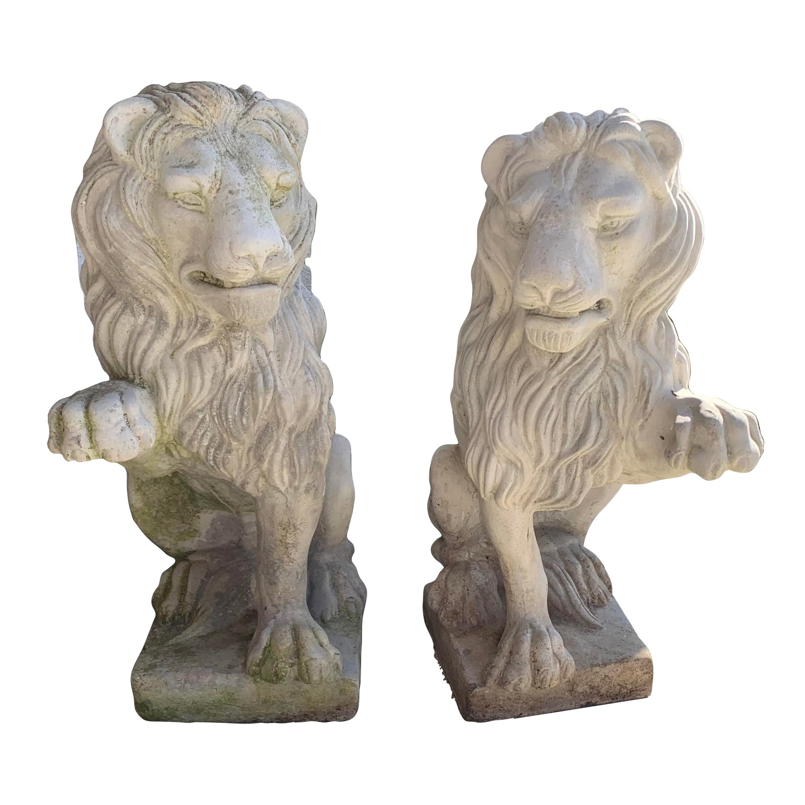 1990s Cast Stone Sitting Lions - a Pair: Elegant and stately this pair of regal lions would enhance any entryway or garden. They have beautiful curly manes and are sitting on their haunches. They each sit on a base which is part of the