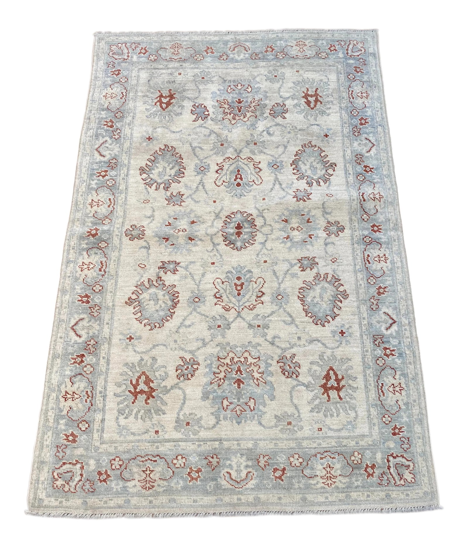 Bellwether Rugs Vintage Oushak Rug: An adorable vintage Oushak rug. This rug offers a neutral palette with light blue and rust colored accents. Condition: Alterations: Original Condition Unaltered Imperfections: Some Imperfections