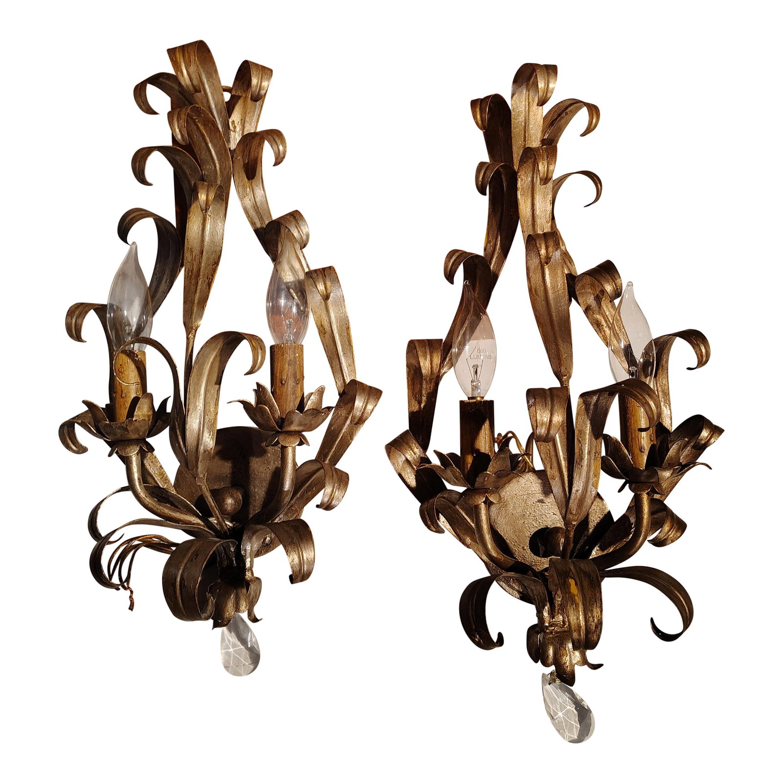 Italian Tole Sconces Mid Century a Pair: this pair of Italian sconces date back to the 1960's they are 18"long by.9.5"wide by 5" deep they are gold in color and made of tole metal that are beautiful and each sconces holds two candelabra, it 