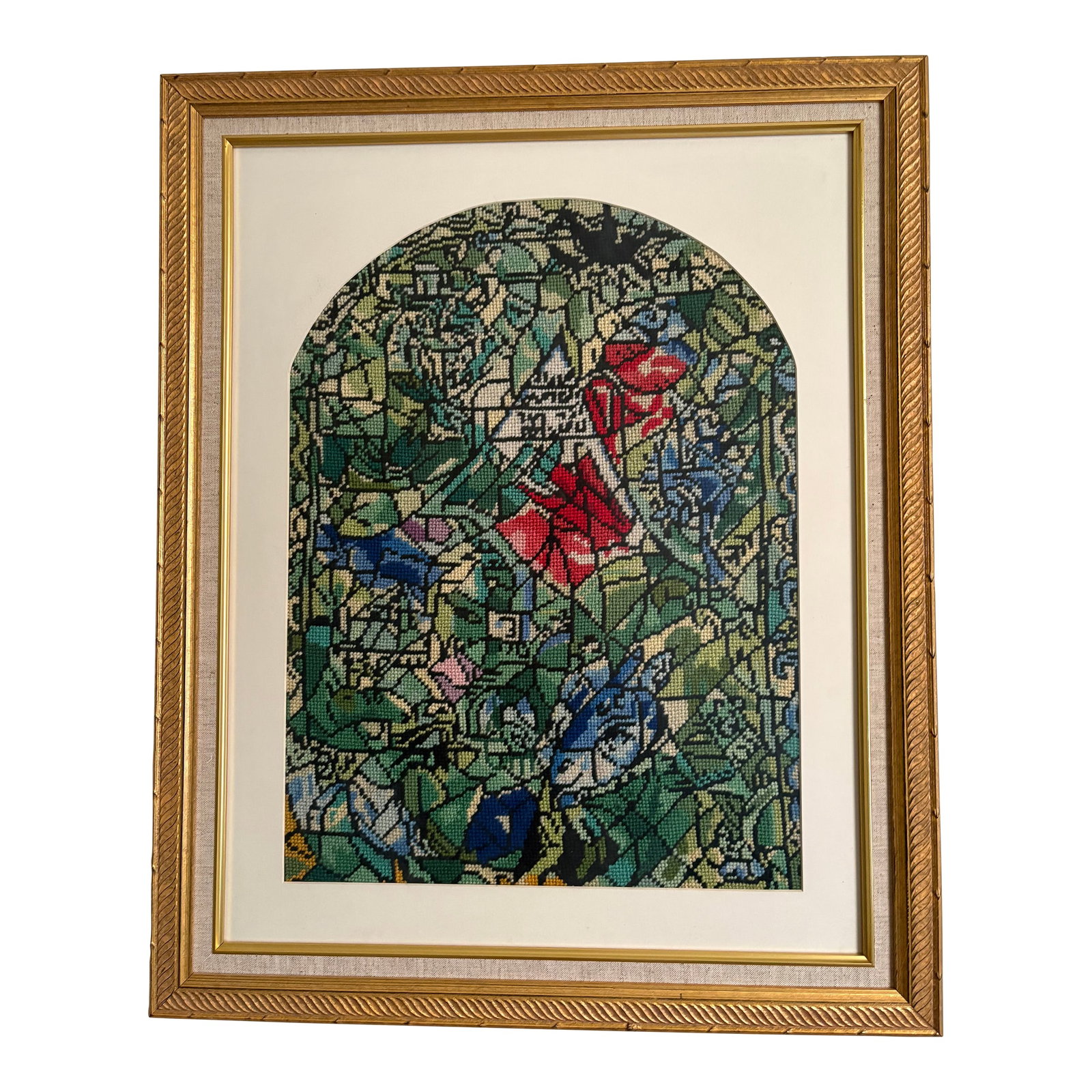 Vintage Needlepoint Tapestry - After Marc Chagall: A vintage needlepoint profiled in a museum quality frame. Of a stained glass window by Marc Chagall. Marc Chagall debuted a series of biblically inspired stained-glass windows at the Louvre in Paris