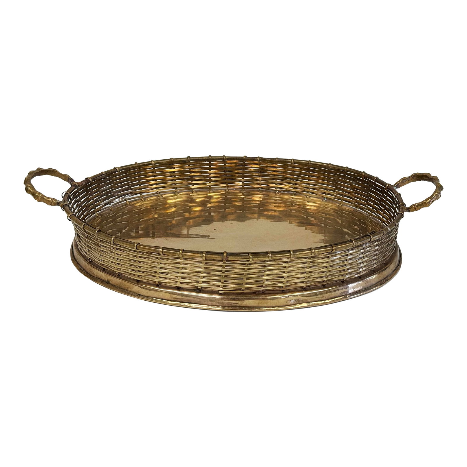 Vintage Brass Handled Tray With Basketweave Detail: Vintage brass tray with basket weave detail to railing and faux bamboo style handles. Tray interior measures 12.25"L x 8"W. Patina to brass. Condition: Alterations: Original Condition Unaltered