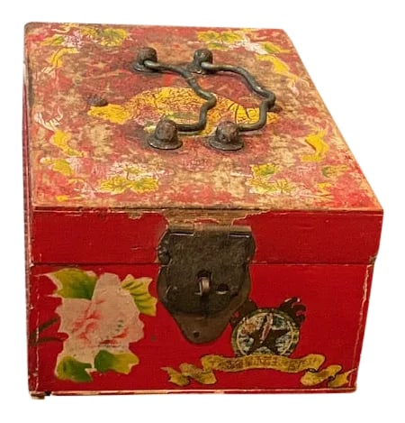Vintage Chinese Jewlery Box: This vintage jewlery box with inside mirror is a fancyful decorative object. It has the original metal handles and lock with Chinese caligraphy. A fun addition to a vanity or box collection. The box i